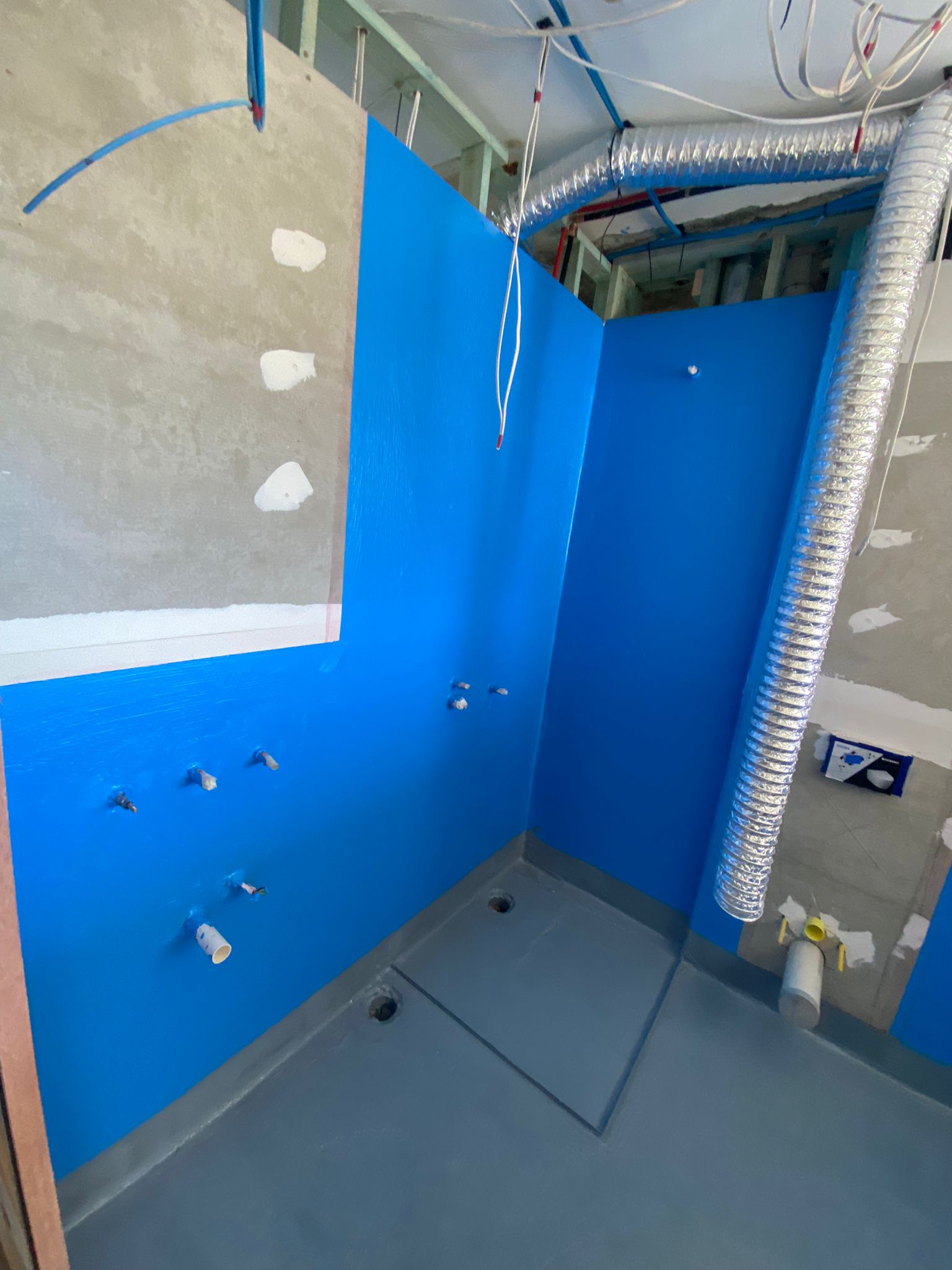 Blue waterproofing membrane - shower recess corner - Sydney Choice Waterproofing