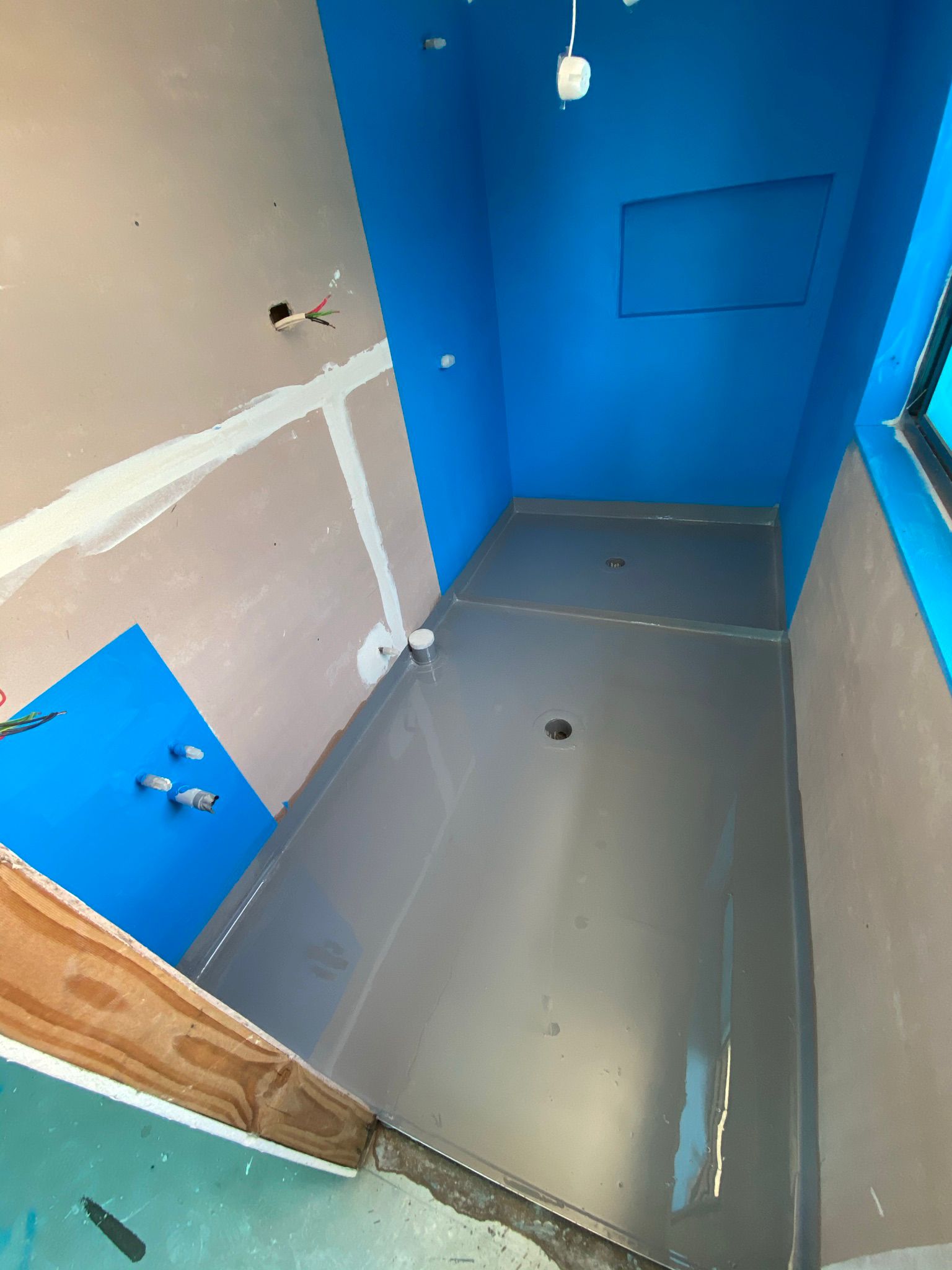 Blue waterproofing membrane - wall and floor corner - Sydney Choice Waterproofing